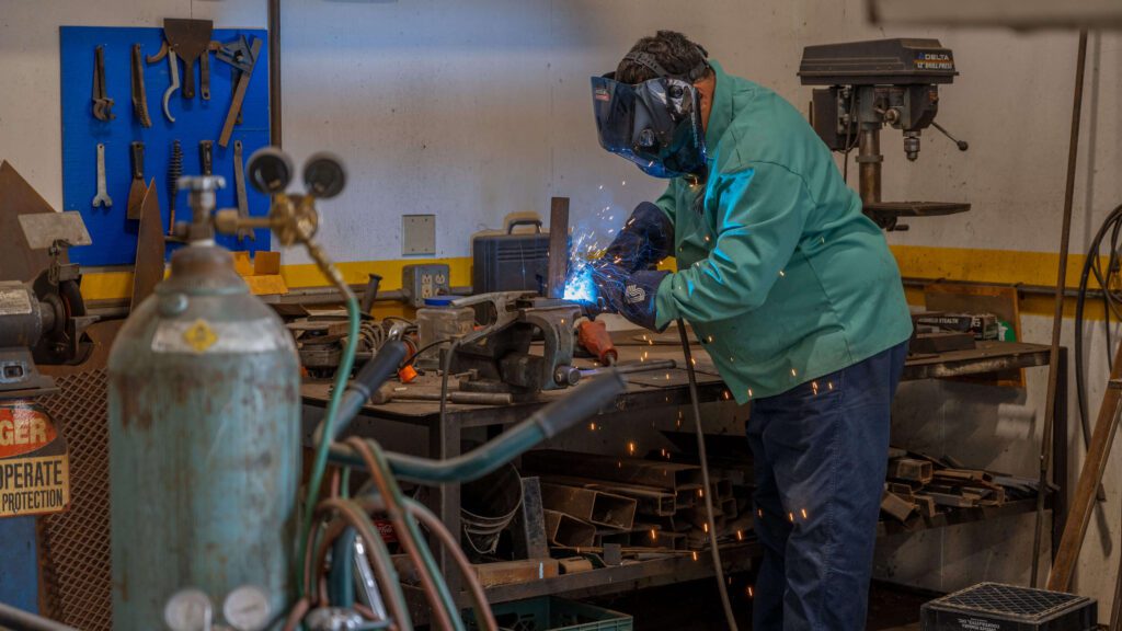 Maintenance worker welding